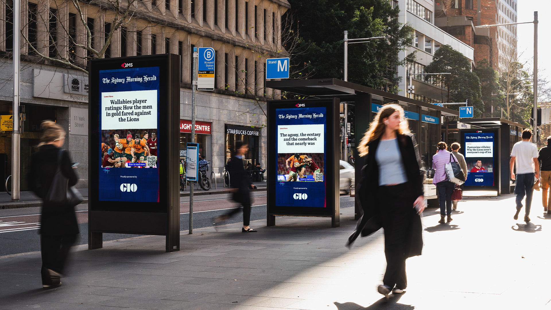 Digital Billboards in Sydney showing Sydney Morning Herald news about the rugby